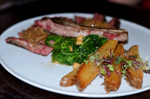 Bone-in Rib Eeye with triple-fried potatoes at the Sign of the Whale