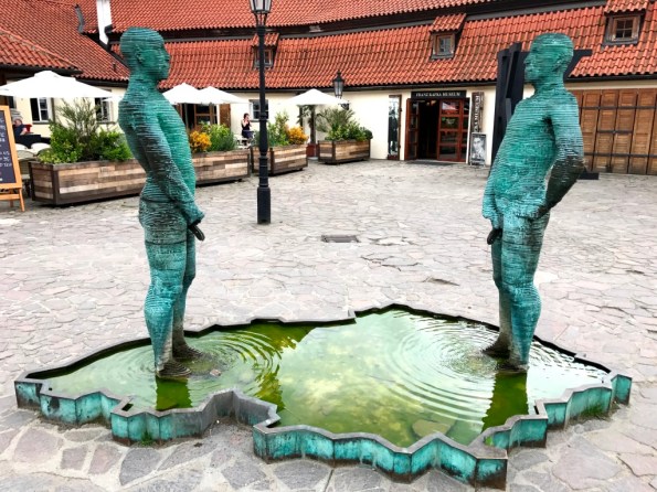 Peeing man sculpture kafka Museum