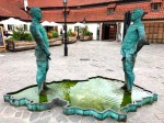 Peeing man sculpture at Kafka Museum